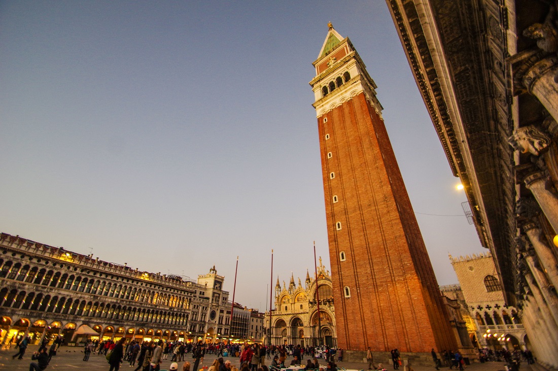 Piazza San Marco in Venice at dusk. Italy is welcoming digital nomads, students, and the new world of home office.