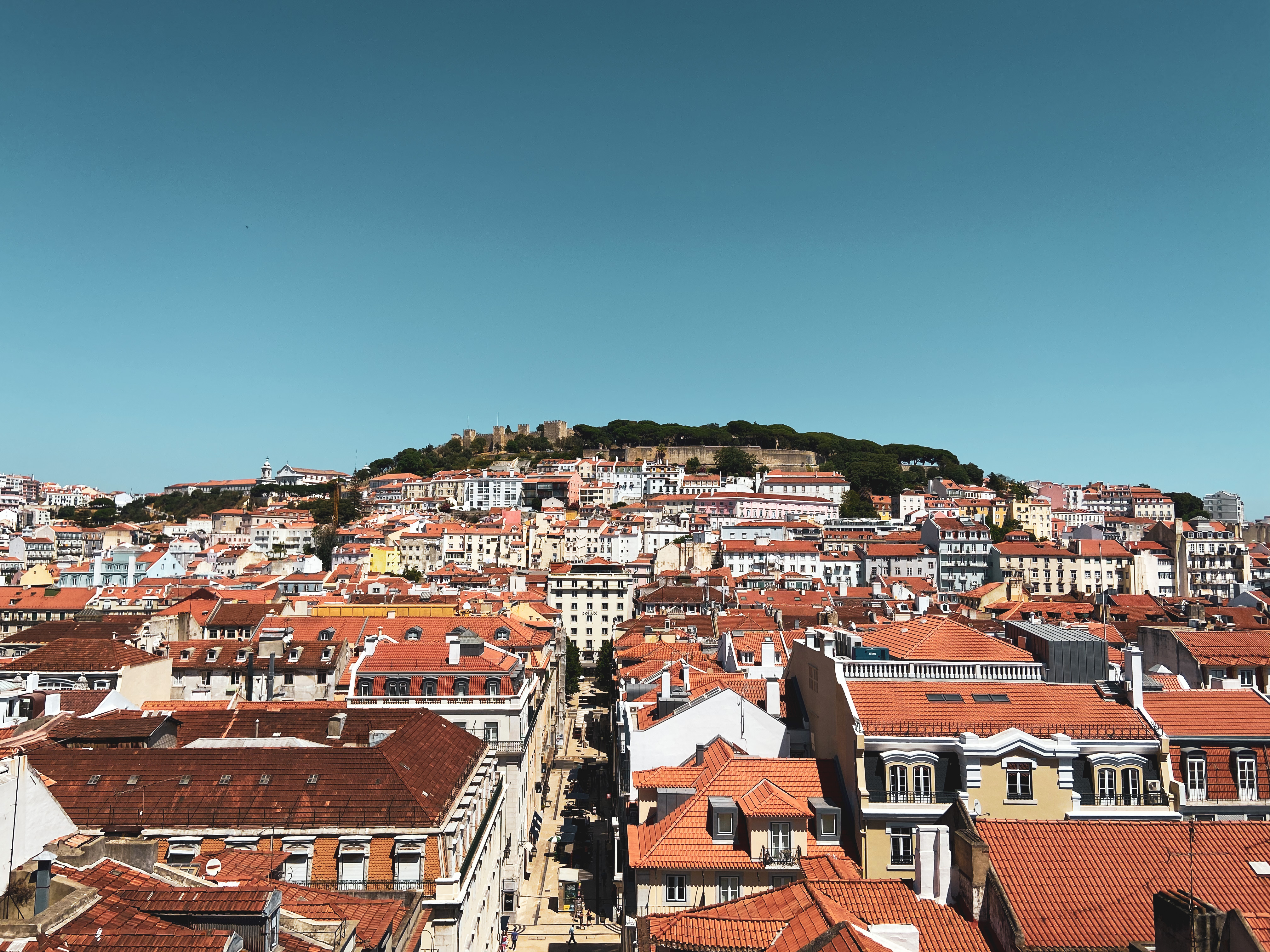 Travel during COVID 19. A view of Lisbon under a blue sky