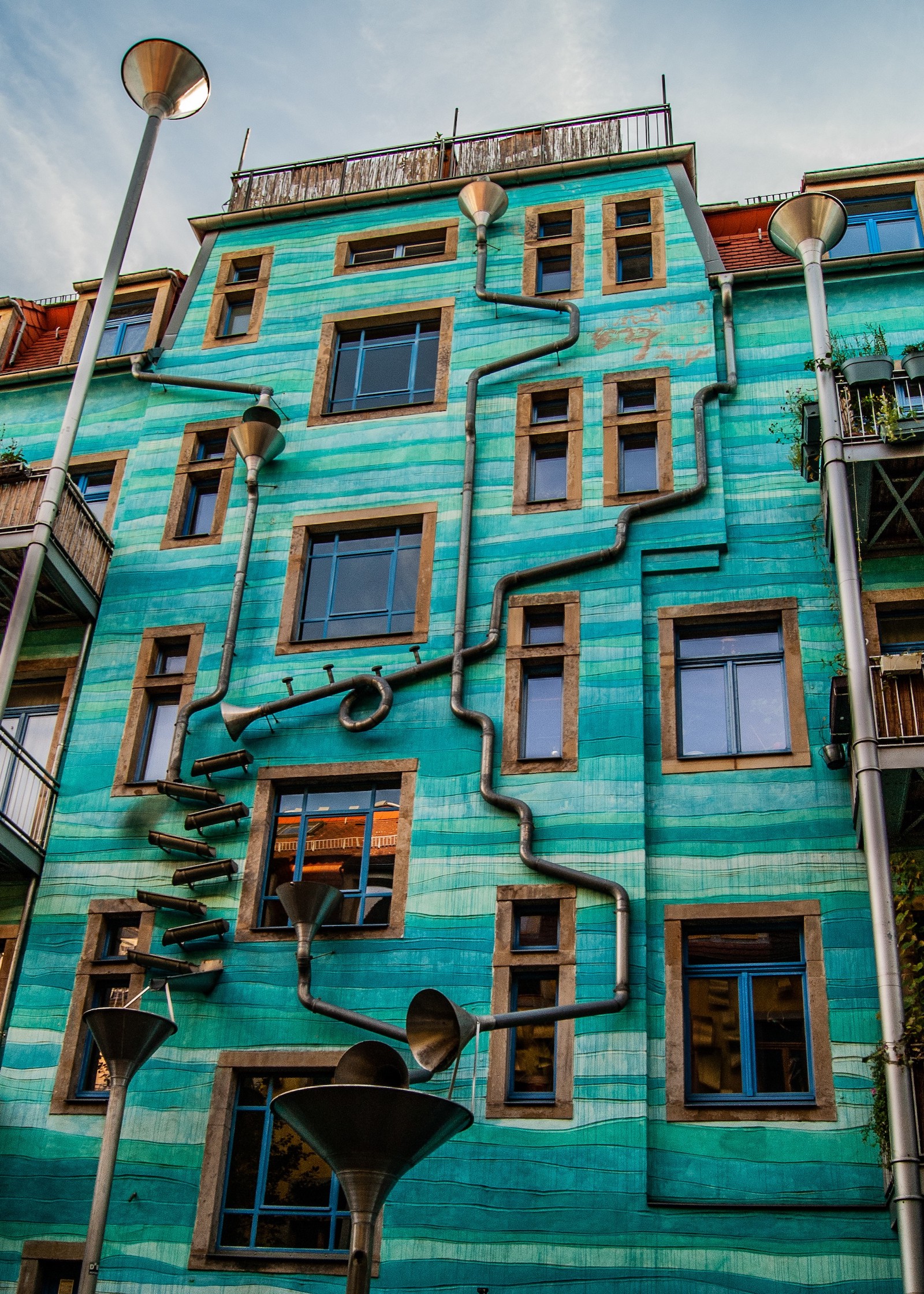 A colourful blue facade in Kunsthofpassage in Neustadt, Dresden. Photo by @conjulia