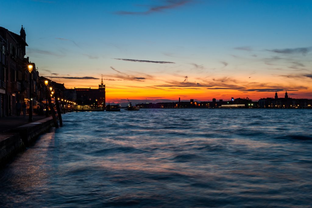 waters at the borders of venice at sunset